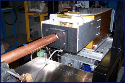 This is a fully automatic system that anneals the 4&rdquo; length of each copper tube.  Tube size diameters range from 1&rdquo; to 4&rdquo;. Process is designed for full automatic operation as the tubes are fed into the induction annealing system, quenched and then retracted away.