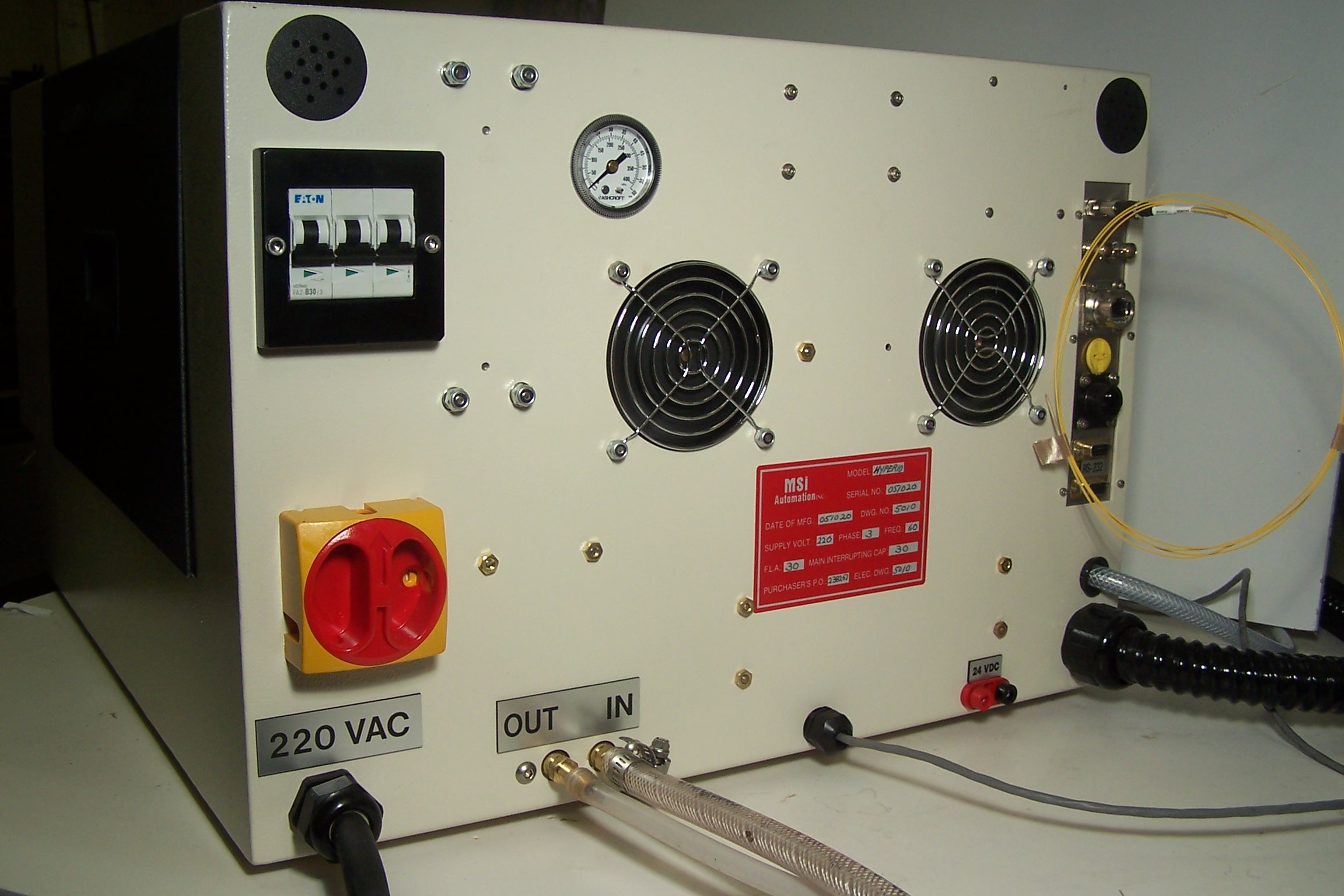 Rear panel of the cabinet with power and water connections